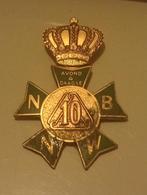 De medaille toont het kroontje, wat verwijst naar de Koninkl, Ophalen, Nederland