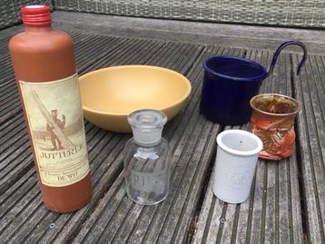 Diverse flessen en bekers beschikbaar voor biedingen