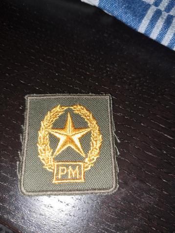 Leger badge PM beschikbaar voor biedingen