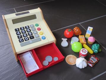 Houten kassa met zonnenenergie en boodschappen. beschikbaar voor biedingen