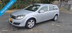 Opel Astra Wagon 1.6 Enjoy, Auto's, Voorwielaandrijving, Gebruikt, Zwart, Origineel Nederlands