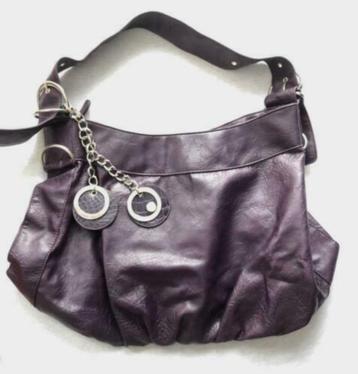 Nieuwe paarse tas beschikbaar voor biedingen