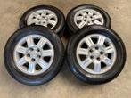 15 inch originele velgen Kia Carens met zomerbanden