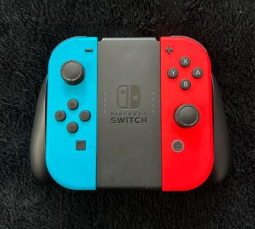 NIEUWE Nintendo Switch Joycons - Neon Ro/Bla Met Joycon Grip beschikbaar voor biedingen