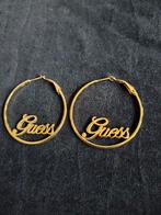 Guess oorbellen goldplated Gues logo, Goud, Overige materialen, Ophalen of Verzenden, Zo goed als nieuw