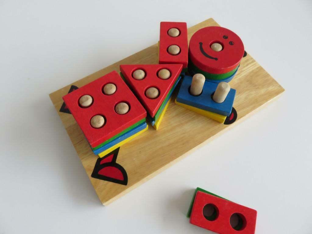 Houten stapelpuzzel mannetje maken in verschillende kleuren, Ophalen of Verzenden, Zo goed als nieuw, Overige typen