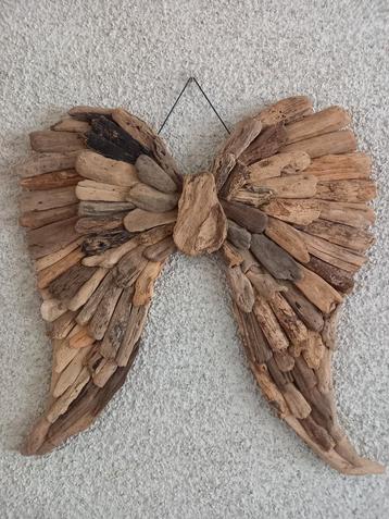 Houten wandornament beschikbaar voor biedingen