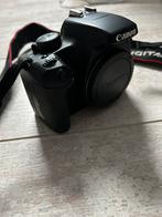 Canon 1000d + 2 lenzen en uv-filter en toebehoren, Audio, Tv en Foto, Fotocamera's Digitaal, Ophalen of Verzenden, Zo goed als nieuw
