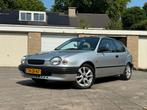 Toyota Corolla 1.3 HB 1998 Grijs, Auto's, Voorwielaandrijving, 4 cilinders, Corolla, Origineel Nederlands