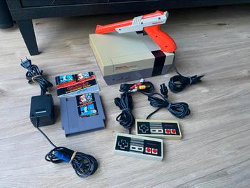 Nintendo Nes Action set + 2 controllers,zapper en mario bros beschikbaar voor biedingen