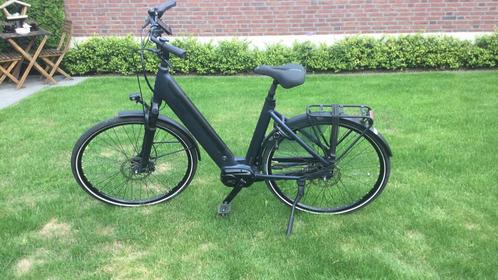 Dames en Heren e-bike middenmoter Qwic, Fietsen en Brommers, Elektrische fietsen, Gebruikt, Qwic, 47 tot 51 cm, 50 km per accu of meer
