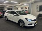 Opel Astra Sports Tourer 1.2 *NAP*Xenon*Navigatie*2021*velge, Gebruikt, Euro 6, 1199 cc, Wit