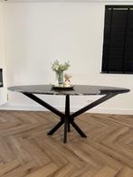 Zwart-Marmeren ovale eettafel met zwarte poten, Huis en Inrichting, Tafels | Eettafels, Overige materialen, Zo goed als nieuw