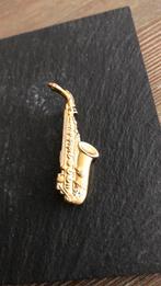 Broche en dasspeld saxofoon, Sieraden, Tassen en Uiterlijk, Broches, Ophalen of Verzenden, Zo goed als nieuw, Overige materialen