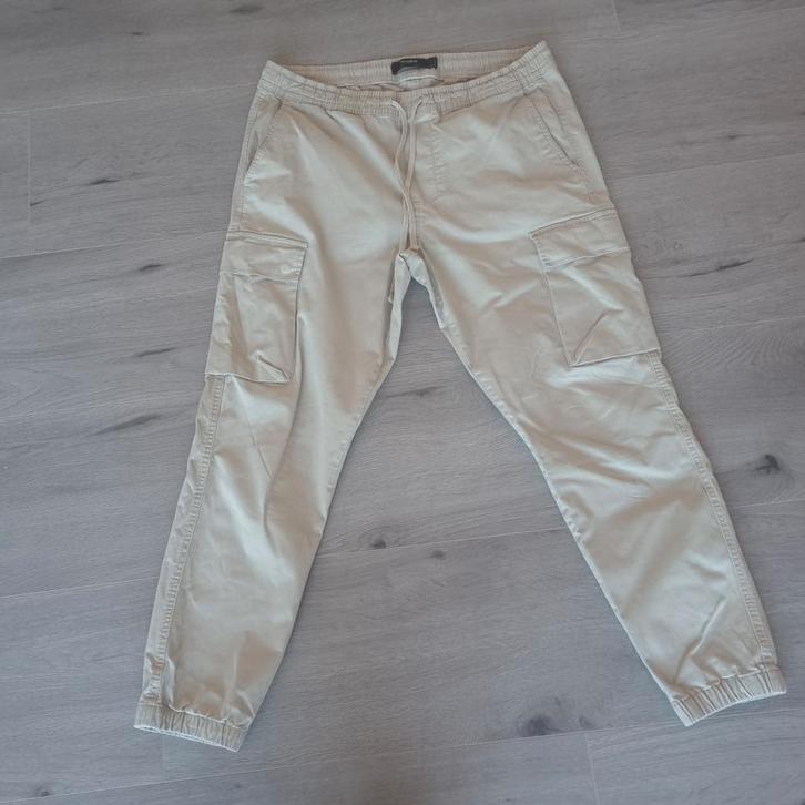 Beige cargo broek - Pull&Bear, Kleding | Dames, Broeken en Pantalons, Gedragen, Maat 42/44 (L), Beige, Lang, Ophalen of Verzenden