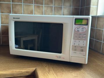 Magnetron oven met boven- en onder grill beschikbaar voor biedingen