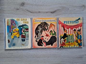 Gouden boekjes de gele taxi circus ondersteboven pietepaf beschikbaar voor biedingen