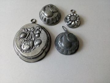Tinnen pudding/siervormpjes. Wanddecoratie keuken. beschikbaar voor biedingen