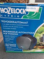 Visvoeder automaat Hozelock, Ophalen