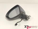 Buitenspiegel links van een Opel Astra