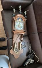 Antieke wuba friesestaart wandklok, Ophalen