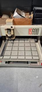 Graveermachine IS600 met accessoires en computer, Ophalen