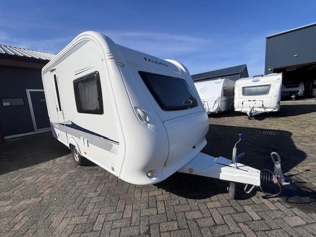 Hobby De Luxe 380 TB bj.2012 met VOORTENT EN FIETSENREK!!!!, Standaardzit, Hobby, Tot en met 2, Bedrijf