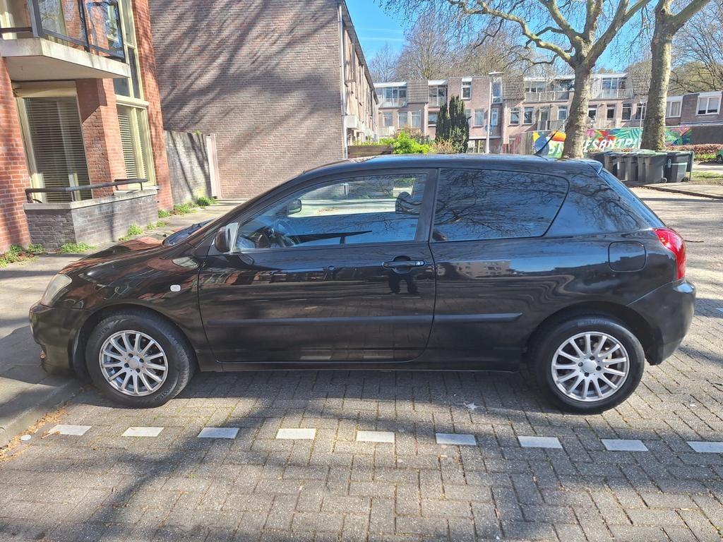 Leuke sportieve frisse Corolla!, Auto's, Voorwielaandrijving, Zwart, 4 cilinders, Corolla
