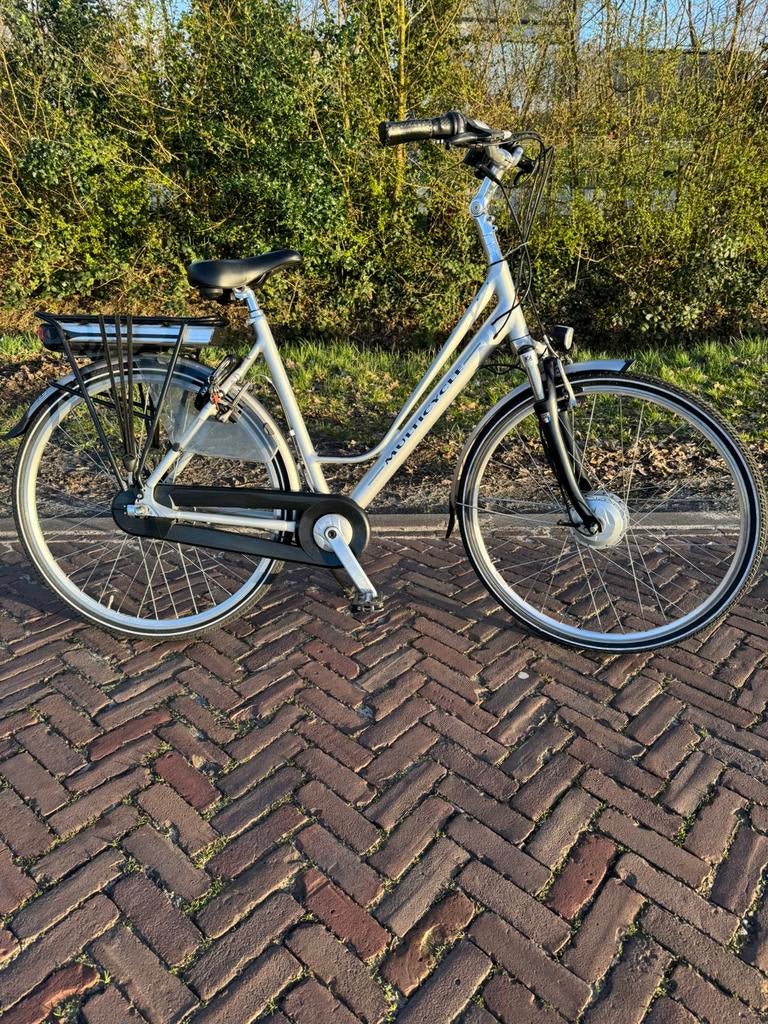 Multicycle Elektrische fiets Damesfiets met boekjes ZGAN MC, Zo goed als nieuw, 51 tot 55 cm, 50 km per accu of meer, Ophalen