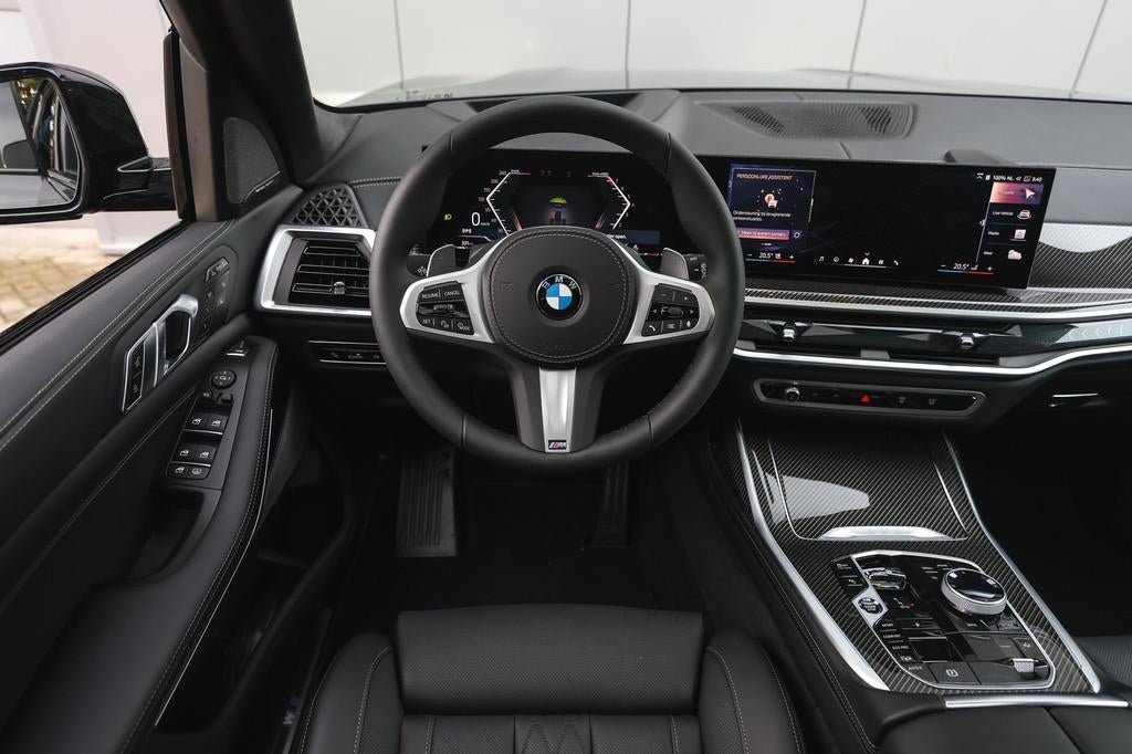BMW X7 xDrive40i M Sport Automaat / Panoramadak Sky Lounge /, Auto's, BMW, Met garantie (alle), 334 pk, 7 stoelen, Zwart