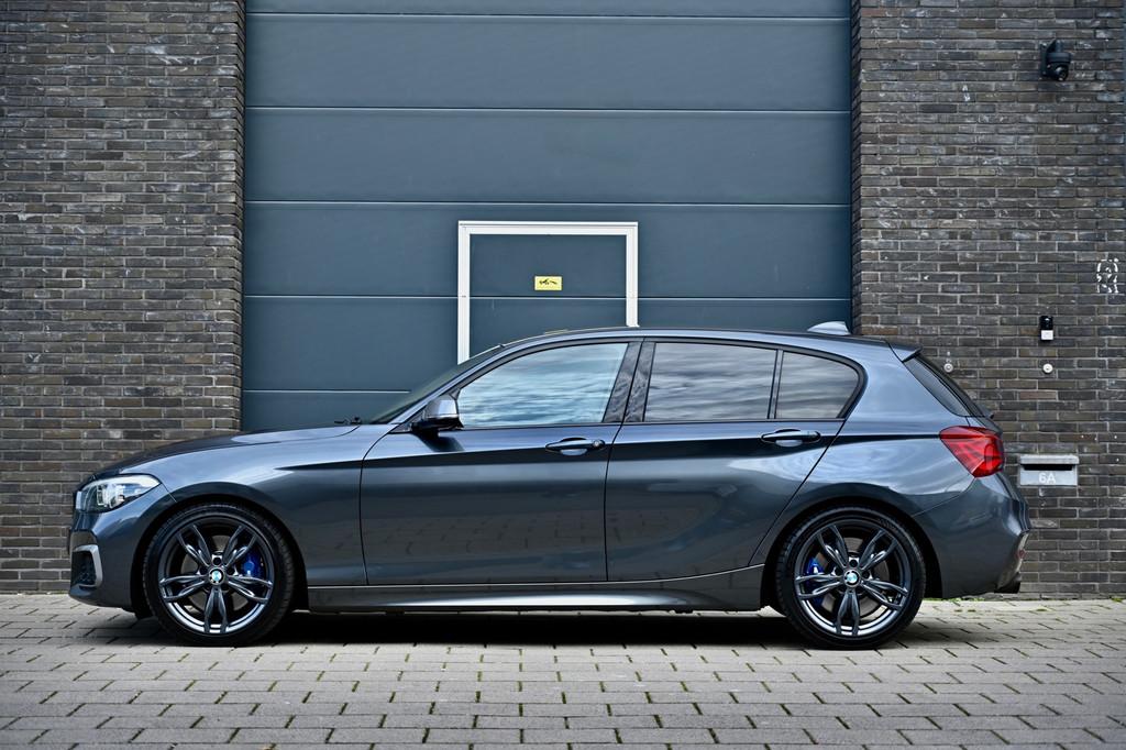 BMW 1-serie M140i xDrive 480PK | Mineral Grau | Akrapovic |, Gebruikt, Alcantara, 14 km/l, Bedrijf