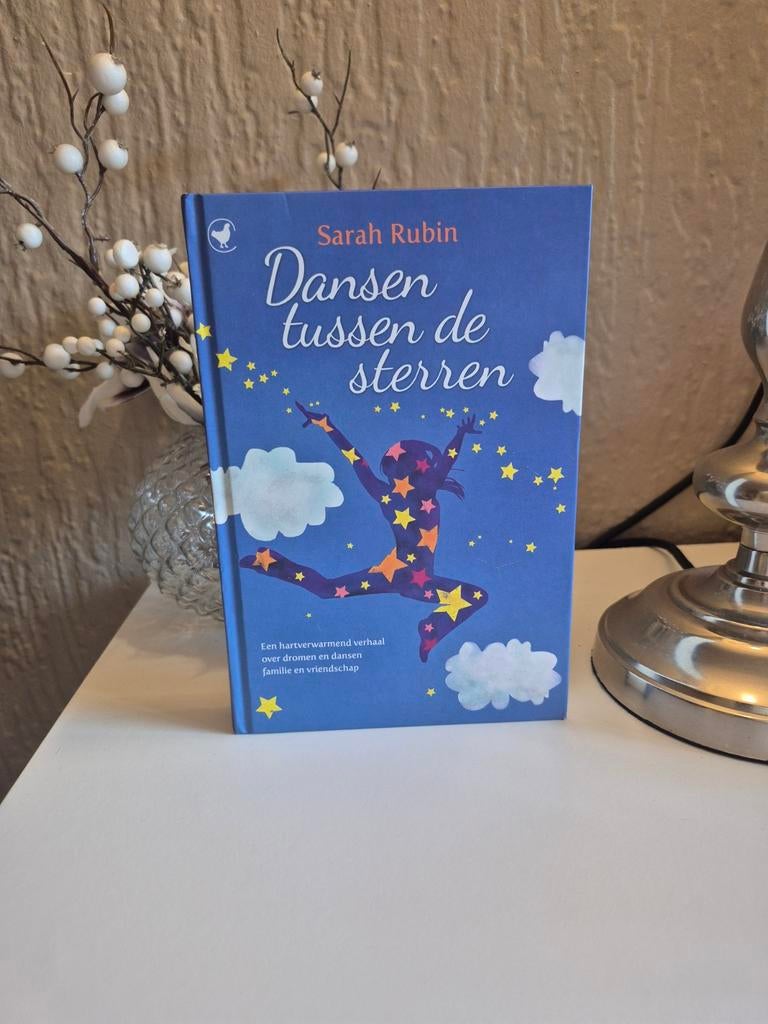Dansen tussen de sterren - Sarah Rubin, Boeken, Ophalen of Verzenden, Zo goed als nieuw, Sarah Rubin, Fictie algemeen