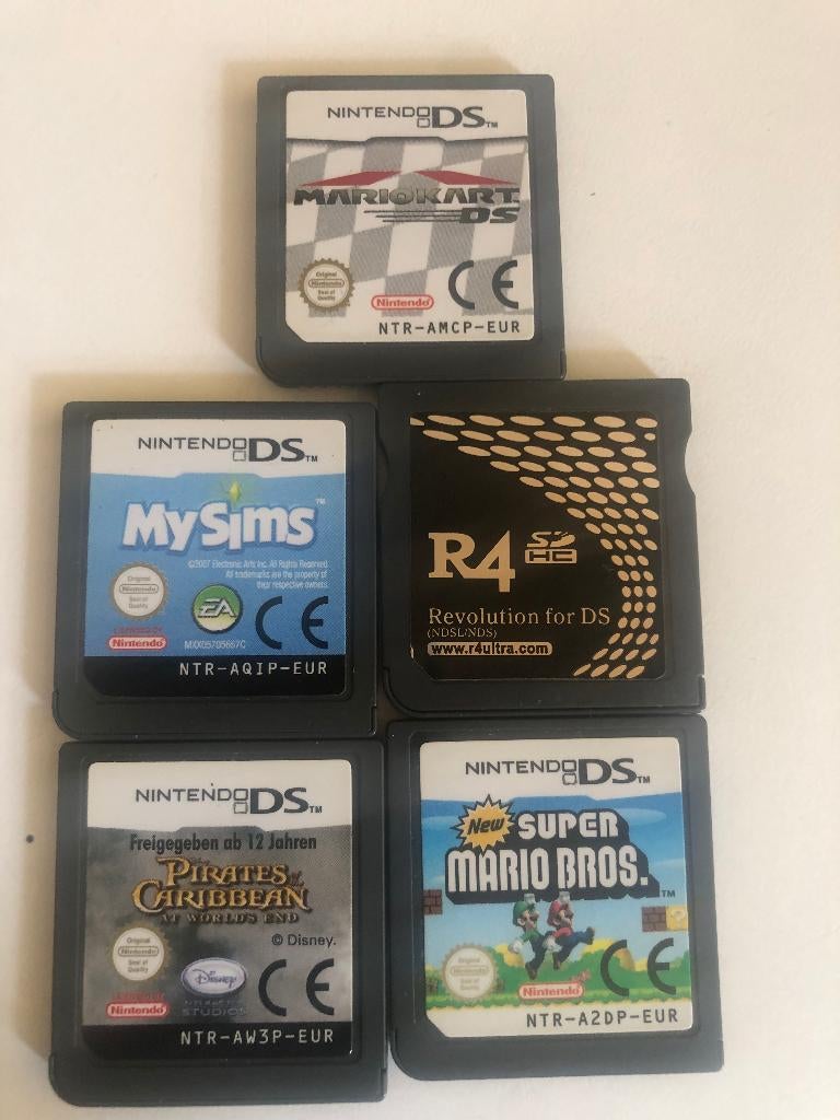 4 originele Nintendo DS games en 1 R4-flashkaart, Verzenden, Zo goed als nieuw, DS Lite, Met games