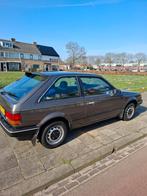 Mazda 323 1.3 HB 1985 Grijs, Auto's, Mazda, 4 cilinders, 400 kg, Origineel Nederlands, Overige kleuren