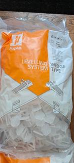 Fixplus Tegel Levelling clips 2 mm 2000st - Nieuw in doos!, Overige materialen, Nieuw, Minder dan 20 cm, Minder dan 5 m²
