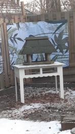 Vogelhuisje op tafel, Ophalen, Gebruikt