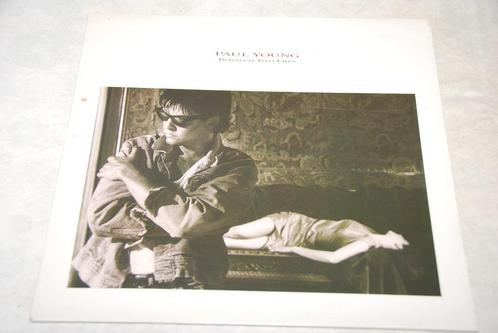 Paul Young – Between Two Fires LP Vinyl, Cd's en Dvd's, Vinyl | Pop, Gebruikt, 1980 tot 2000, 12 inch, Ophalen of Verzenden