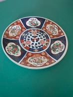 Porseleinen ronde wandplaat in blauw en oranje, Ophalen of Verzenden