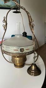 Zware kopere olielamp, Ophalen