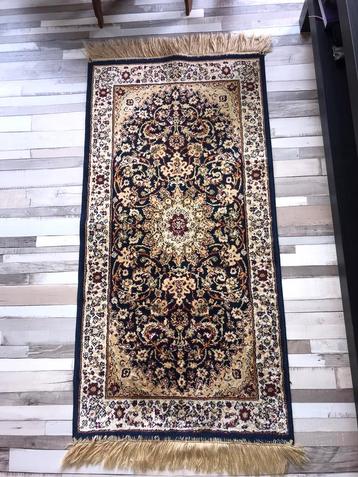 a silk handmade Persian carpet