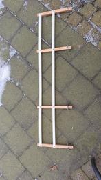 Rugsteun voor slee, Ophalen