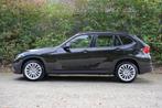 BMW X1 sDrive20i Executive Aut | Xenon | Navi | Pano | Clima, Gebruikt, Euro 6, 4 cilinders, Zwart