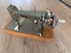 Antieke PFAFF 16 handnaaimachine, Ophalen