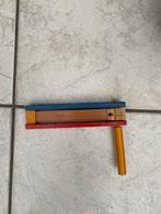 Houten ratel, Ophalen