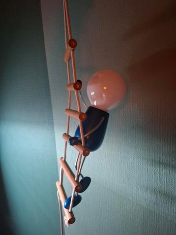 Design hang lamp met figuur op ladder  beschikbaar voor biedingen