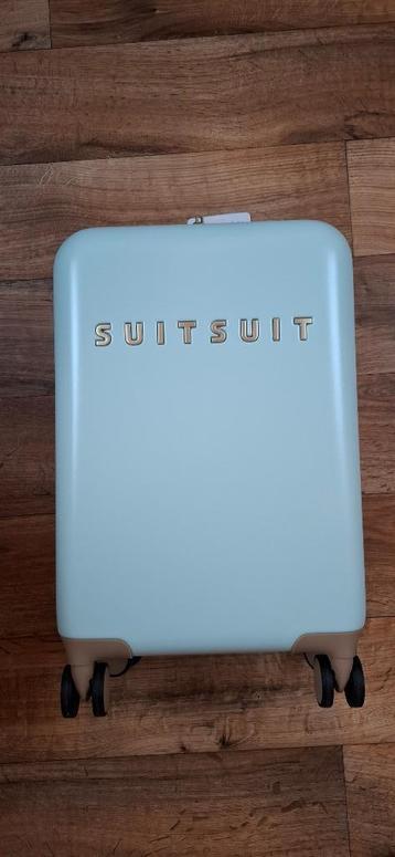 Suitsuit, handbagage koffer beschikbaar voor biedingen
