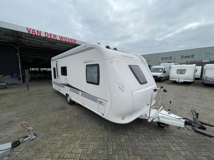 Hobby De Luxe 560 KMFE Mover. cas.luifel airco, Caravans en Kamperen, Caravans, Bedrijf, tot en met 6, 1250 - 1500 kg, Rondzit