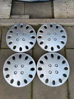 Set originele Opel Corsa B wieldoppen 13” inch, Ophalen of Verzenden, Gebruikt