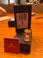 Swarovski zandloper met goud, Verzamelen, Swarovski, Ophalen of Verzenden, Zo goed als nieuw, Figuurtje