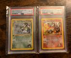 2000 1st edition - Blaine’s Charizard/Erika’s Venusaur PSA8, Ophalen of Verzenden, Zo goed als nieuw, Meerdere kaarten